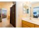 Bright bathroom with dual sink vanity and neutral finishes at 3738 Amber Lantern Cir, Las Vegas, NV 89147