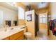 Well-lit bathroom with a single sink vanity and shower-tub combination at 3738 Amber Lantern Cir, Las Vegas, NV 89147