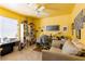 Bedroom with a sofa, a ceiling fan, and a variety of personal touches and natural light at 3738 Amber Lantern Cir, Las Vegas, NV 89147