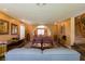 Spacious carpeted living room featuring couches, lighting, and art at 3738 Amber Lantern Cir, Las Vegas, NV 89147