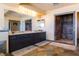 Luxurious bathroom featuring granite countertops, a step-in shower, and dual sink vanity at 3738 Amber Lantern Cir, Las Vegas, NV 89147