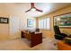 Bright office featuring a large desk and ample natural light at 3738 Amber Lantern Cir, Las Vegas, NV 89147
