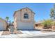 Charming two-story home with a two-car garage and well-kept landscaping at 3741 Cactus Wheel Ct, Las Vegas, NV 89129