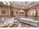 Bright bathroom featuring a jacuzzi tub, tile accents, and neutral walls at 4045 N Chieftain St, Las Vegas, NV 89129