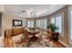 Inviting dining room featuring an oval table with seating for six and an elegant light fixture at 4045 N Chieftain St, Las Vegas, NV 89129