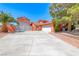 Spacious property with a large driveway and two garages at 4045 N Chieftain St, Las Vegas, NV 89129
