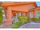 Inviting covered front porch with seating at 4045 N Chieftain St, Las Vegas, NV 89129