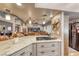 Modern kitchen features a cooktop island, stainless steel appliances, and an open layout at 4045 N Chieftain St, Las Vegas, NV 89129
