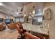 Open-concept kitchen features a granite countertop breakfast bar with seating and pendant lighting at 4045 N Chieftain St, Las Vegas, NV 89129