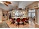 Spacious kitchen offers a breakfast bar with seating, stainless steel appliances, and custom cabinetry at 4045 N Chieftain St, Las Vegas, NV 89129