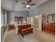 Comfortable main bedroom with cool color palette, window seat, and en suite bathroom at 4045 N Chieftain St, Las Vegas, NV 89129