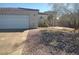 Exterior view of a single story home, featuring desert landscaping at 424 Wright Way, Henderson, NV 89015