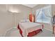 Cozy bedroom with a corner window, soft lighting, and a comfortable bed at 4724 Stavanger Ln, Las Vegas, NV 89147