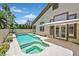 Inviting backyard pool with an attached spa and a covered patio, perfect for relaxation and outdoor living at 4724 Stavanger Ln, Las Vegas, NV 89147