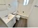 Bathroom featuring a single vanity, commode and tub with shower at 4924 Carmen Blvd, Las Vegas, NV 89108