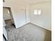 Bedroom with carpeting, a window and closet with sliding doors at 4924 Carmen Blvd, Las Vegas, NV 89108