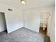 Carpeted bedroom has closet and access to the ensuite bathroom at 4924 Carmen Blvd, Las Vegas, NV 89108