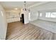 Open concept kitchen features modern appliances, bright cabinetry, and hardwood floors at 4924 Carmen Blvd, Las Vegas, NV 89108