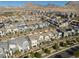 Desert community showcasing modern townhomes, landscaping, and scenic mountain views at 494 Mahogany Ridge St, Las Vegas, NV 89138