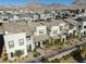 Desert landscaping adorns modern townhomes showcasing the community and mountain views at 494 Mahogany Ridge St, Las Vegas, NV 89138