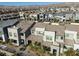 Townhomes with desert landscaping and modern architecture showcase mountain views in the community at 494 Mahogany Ridge St, Las Vegas, NV 89138