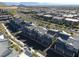 Expansive community features townhomes, desert landscaping, and convenient street access at 494 Mahogany Ridge St, Las Vegas, NV 89138