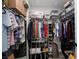 Organized walk-in closet with shelving, hanging racks, and ample storage space at 494 Mahogany Ridge St, Las Vegas, NV 89138