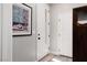 Bright entryway with white walls, a framed print, and multiple doors at 494 Mahogany Ridge St, Las Vegas, NV 89138