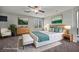 Bright bedroom with warm lighting, modern decor and soft textures at 5232 Mountain Garland Ln, North Las Vegas, NV 89081