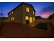 Two-story home with outdoor patio space and low maintenance landscaping at 5232 Mountain Garland Ln, North Las Vegas, NV 89081