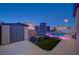 Spacious backyard with a pool, storage shed, solar panels, and ample room for recreation at 528 Lavina Ct, Las Vegas, NV 89123