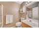 Bright bathroom featuring a shower, a toilet, and a vanity with a mirrored cabinet at 528 Lavina Ct, Las Vegas, NV 89123