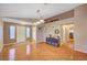 Inviting entryway with wood floors, decorative lighting, and neutral decor at 528 Lavina Ct, Las Vegas, NV 89123