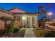 Inviting front entrance with well-maintained landscaping, enhancing the home's curb appeal and creating a warm welcome at 528 Lavina Ct, Las Vegas, NV 89123