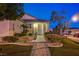 Charming single-story home features a landscaped front yard and welcoming entrance, showcasing curb appeal and a cozy atmosphere at 528 Lavina Ct, Las Vegas, NV 89123