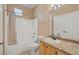 Bathroom with tub, shower, vanity, granite counters, and toilet at 5855 Valley Dr # 2130, North Las Vegas, NV 89031
