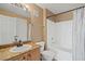 Bathroom featuring a shower-tub combo and vanity sink with stone counter at 5855 Valley Dr # 2130, North Las Vegas, NV 89031
