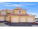 Beautiful condominium featuring a three-car garage, a tile roof, and a well maintained exterior at 5855 Valley Dr # 2130, North Las Vegas, NV 89031