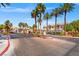 Beautifully landscaped street view with palm trees lining the street at 5855 Valley Dr # 2130, North Las Vegas, NV 89031