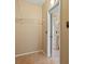 Walk-in closet with shelving, adjacent to the bathroom and bedroom for easy access at 5855 Valley Dr # 2130, North Las Vegas, NV 89031