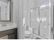 Bathroom with vanity, toilet, and shower featuring a glass door at 5953 Yellow Ridge Ave, Las Vegas, NV 89131