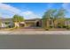 Attractive single-story home with desert landscaping, a brick driveway, and a two-car garage at 5953 Yellow Ridge Ave, Las Vegas, NV 89131