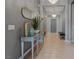 Beautiful hallway with stylish decor, hardwood floors, and modern lighting fixtures at 5953 Yellow Ridge Ave, Las Vegas, NV 89131