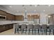 Modern kitchen features stainless steel appliances, pendant lighting, and breakfast bar seating at 5953 Yellow Ridge Ave, Las Vegas, NV 89131