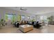Spacious open-concept living space with modern furnishings and lots of natural light at 5953 Yellow Ridge Ave, Las Vegas, NV 89131