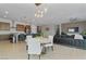 Open concept living space with dining area, kitchen, and a comfortable seating area at 5953 Yellow Ridge Ave, Las Vegas, NV 89131