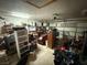 A cluttered garage features tools, boxes, and household items at 6271 Explorer Dr, Las Vegas, NV 89103