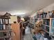 Organized storage room with books, boxes, and plenty of shelving for optimized organization and accessibility at 6271 Explorer Dr, Las Vegas, NV 89103