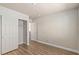 Neutral bedroom with closet and wood-look floors at 6525 Raven Hall St, North Las Vegas, NV 89084