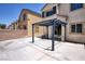 Rear patio featuring pergola, providing a shaded space for outdoor living at 6525 Raven Hall St, North Las Vegas, NV 89084